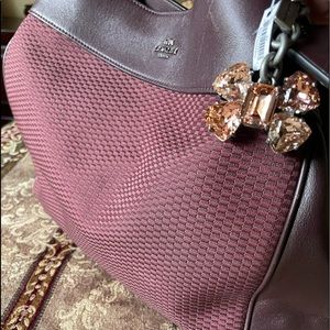 ❣️Coach❣️ Lexy purse. Color: Burgundy. Perfect condition. NEW CHARM W TAGS.